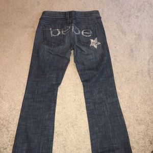 Used Bebe dark blue jeans